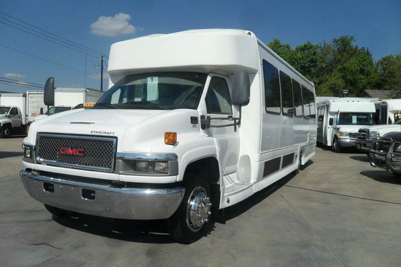White 26 Passenger GMC  Party Bus Rental in Houston, TX | Ridehire - Main View